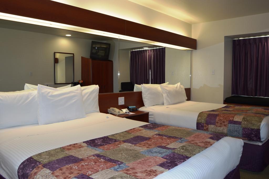Microtel Inn And Suites By Wyndham Miami Ok Værelse billede